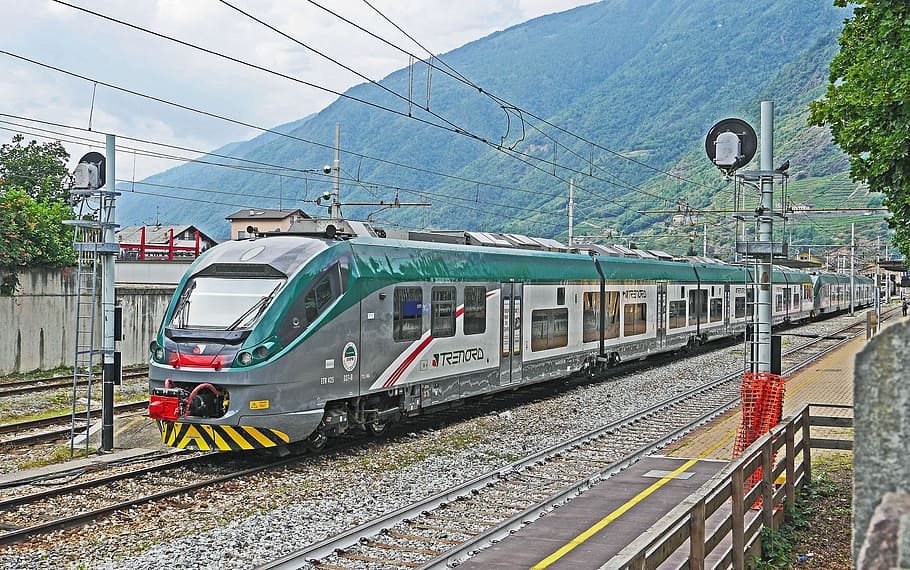 silver and green bullet train on tracks, Trenitalia, Tirano, Regional Train