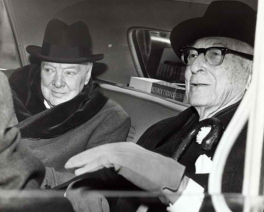 grayscale photography of two men wearing top hat, winston churchill
