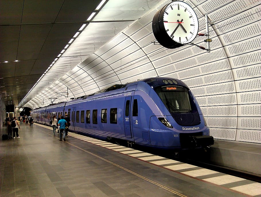 train station clock on 4:46, pågatåg, sweden, subway, platform