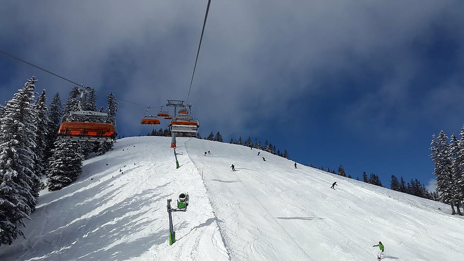 people playing skis on snowfield, chairlift, alpine skiing, downhill skiing