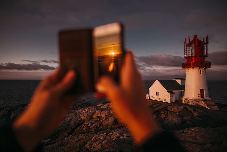 Norway, selective focus photography of red and white lighthouse HD wallpaper