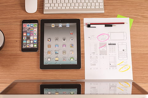 black iPad beside iPhone on brown wooden table, imac, apple HD wallpaper