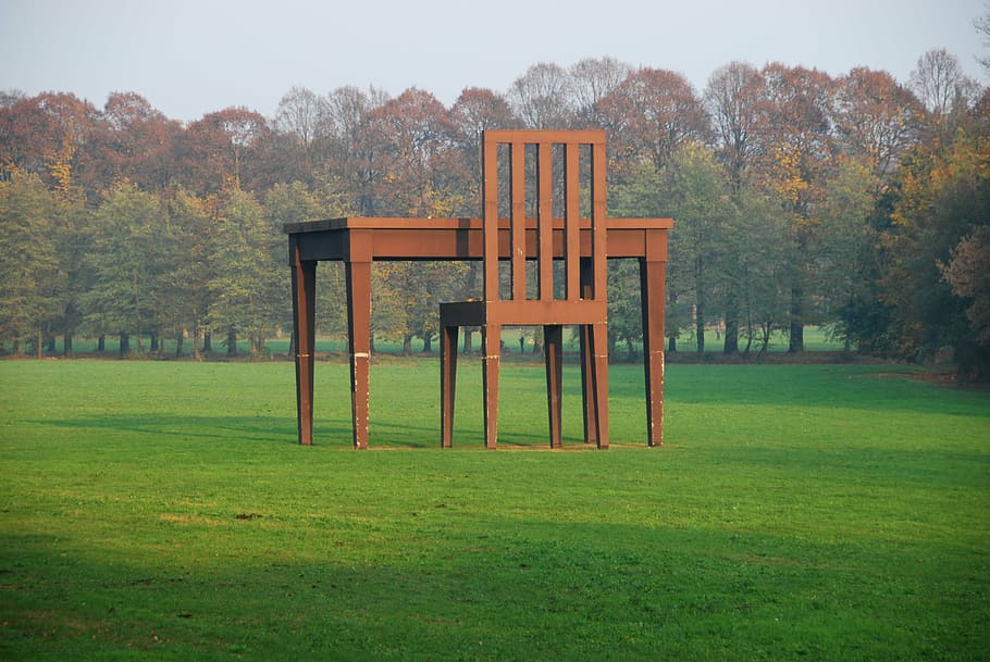 brown wooden desk and chair on green grass field, table, park HD wallpaper