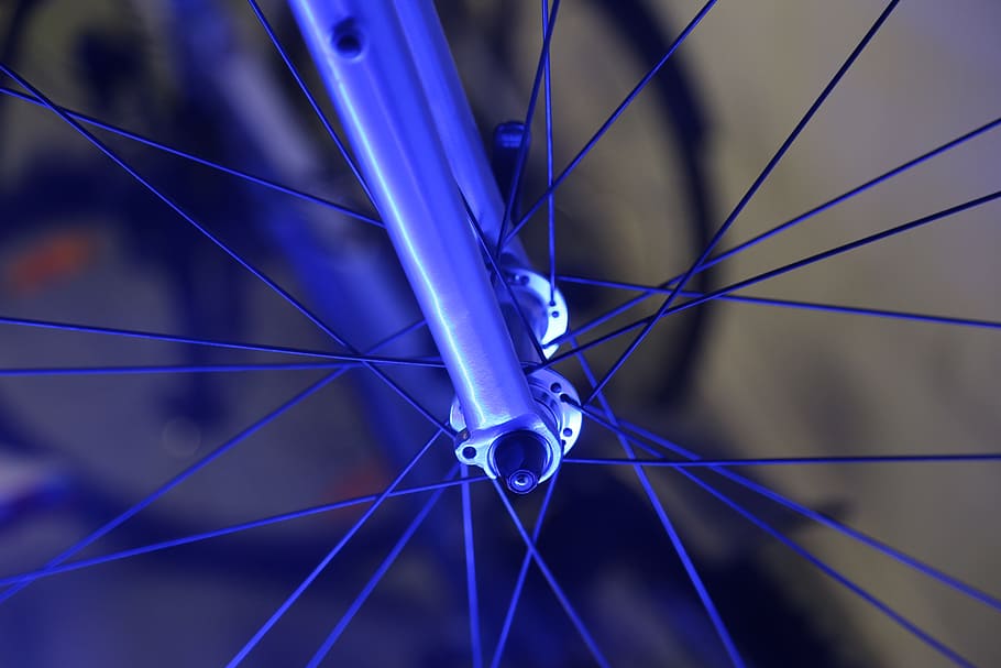 close-up photography of bicycle wheel, bicycle spokes, bike, bicycle tires