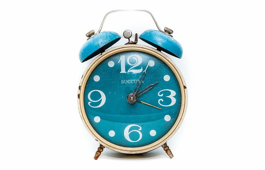 round brass-colored and blue alarm clock, time, hour, minute