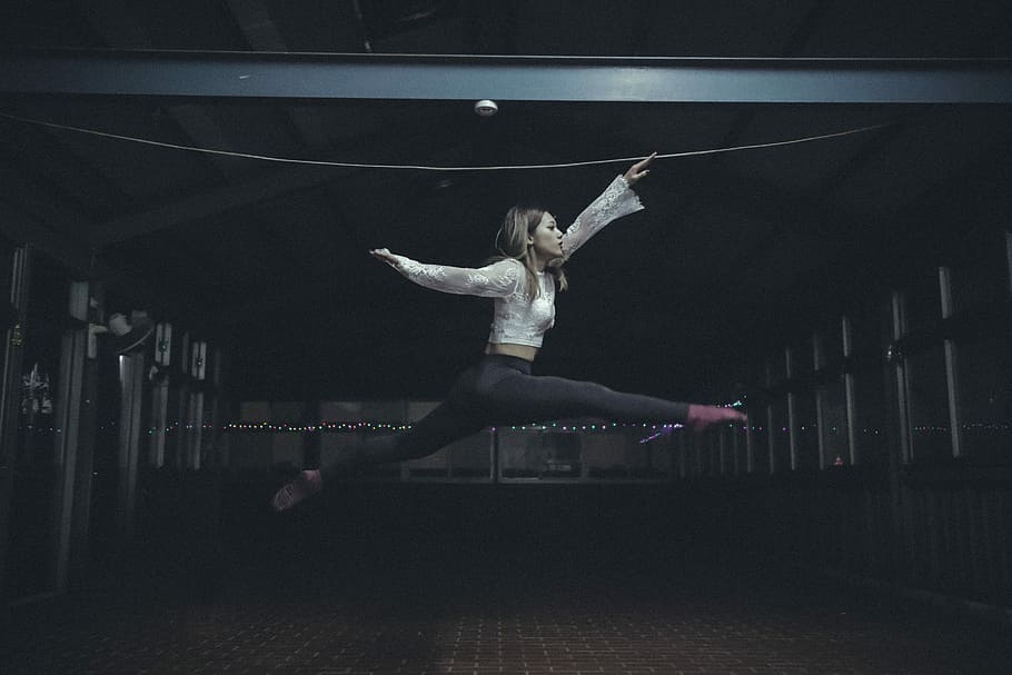woman jumping inside room, time lapse photo of woman posing on air HD wallpaper