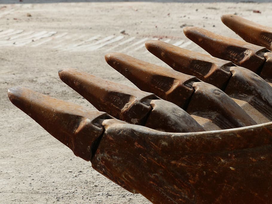 close-up photography of brown excavator bucket, excavator buckets