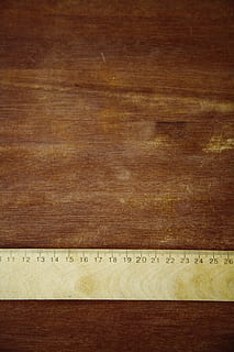 beige ruler on brown wooden surface, measure, folding rule HD wallpaper