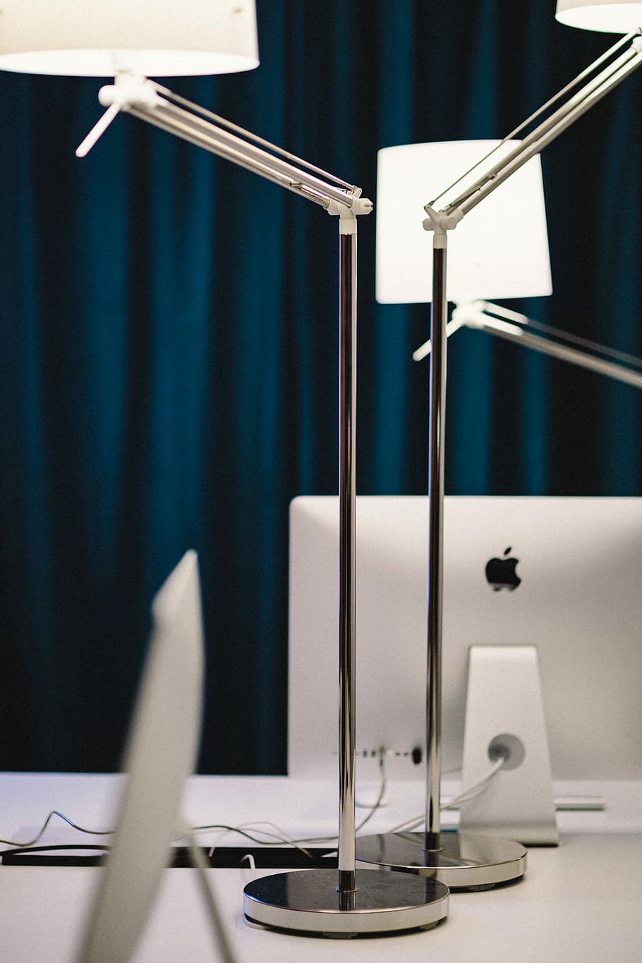 Closeup view of white lamps in the office, Apple iMac, workspace HD wallpaper