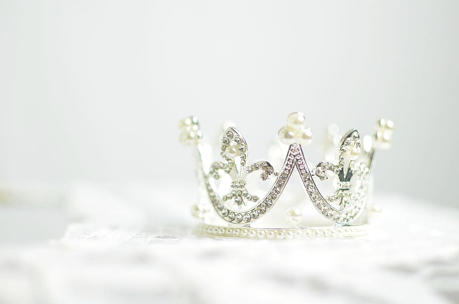 close-up photo of silver-colored crown, bright, crystal, crystals