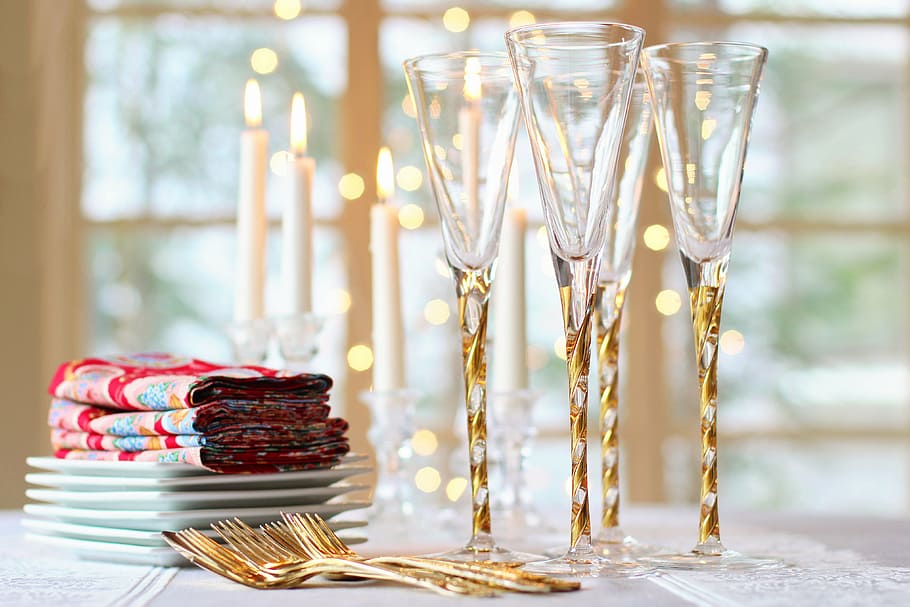 shallow focus photography of gold-colored forks and crystal clear champagne glasses HD wallpaper
