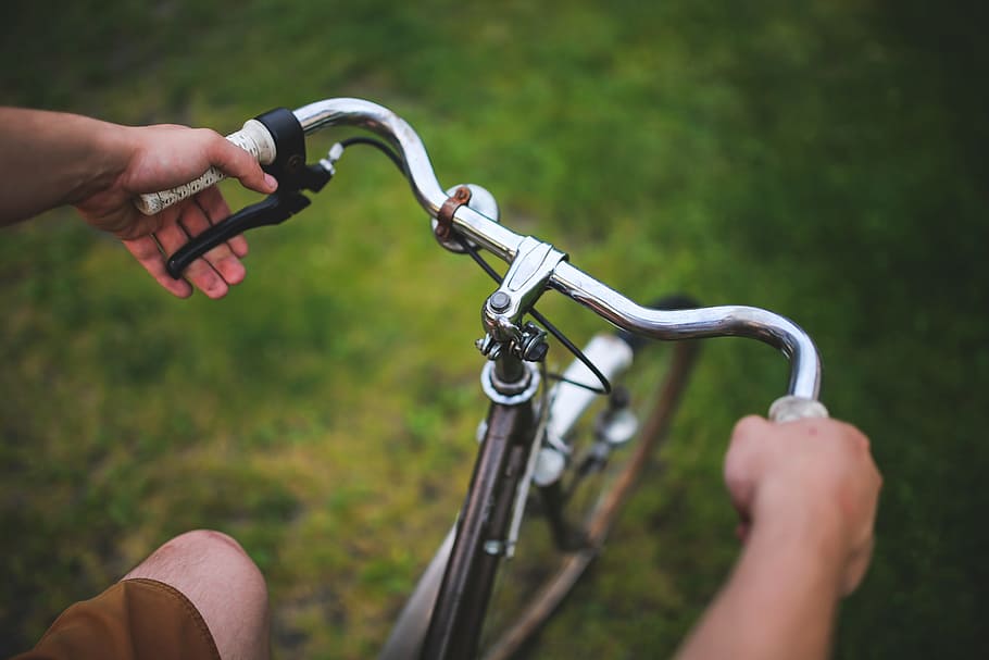 photo of person riding cruiser bike, man, boy, hold, holding HD wallpaper