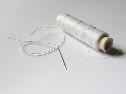 white thread roll beside needle on white surface, reels, sewing HD wallpaper