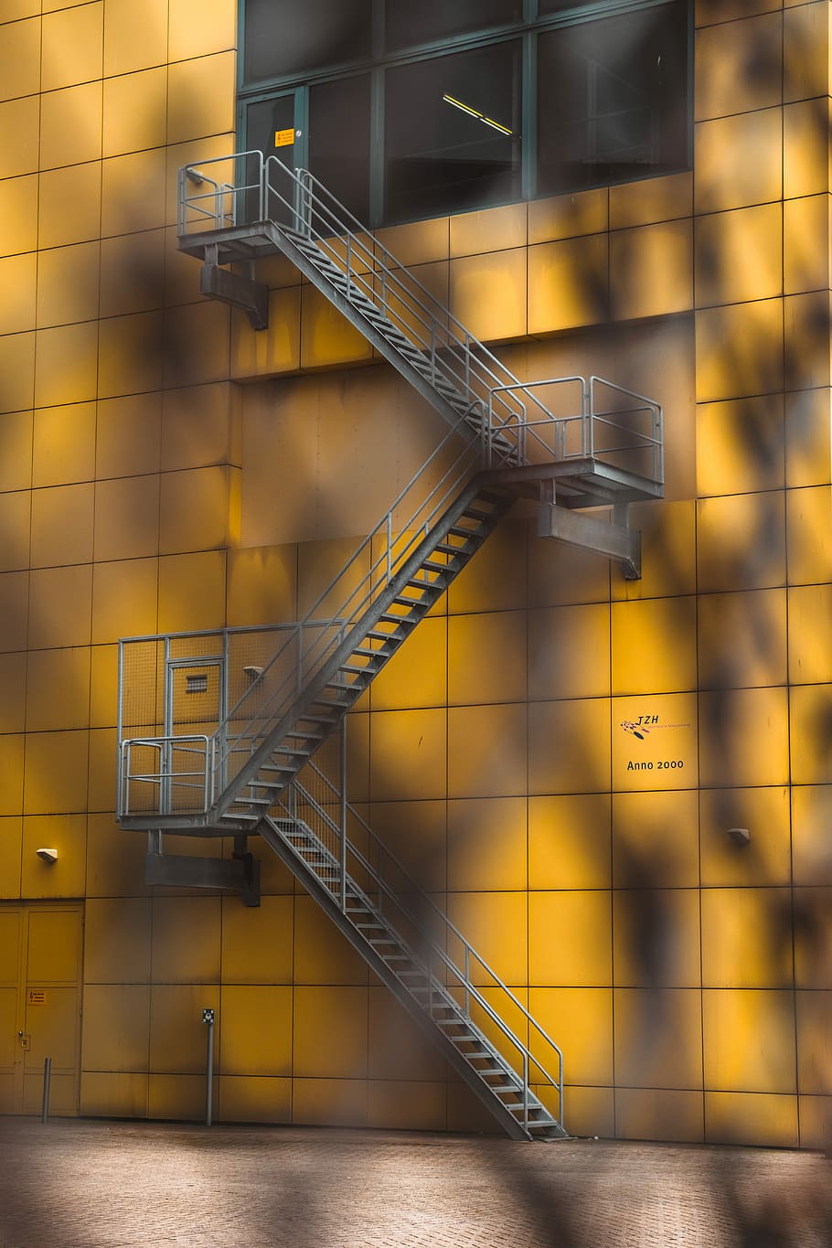 HD wallpaper: gray steel ladder beside yellow building, photo of ...