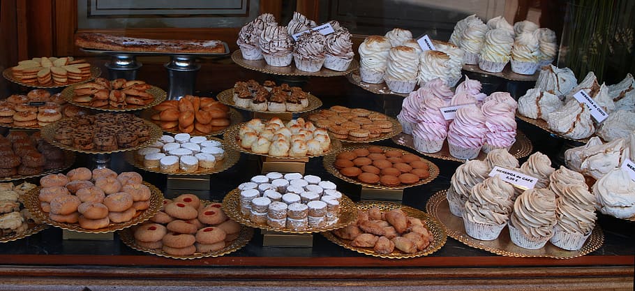 assorted cup cakes in trays, sweets, bakery, shop window, bakery window
