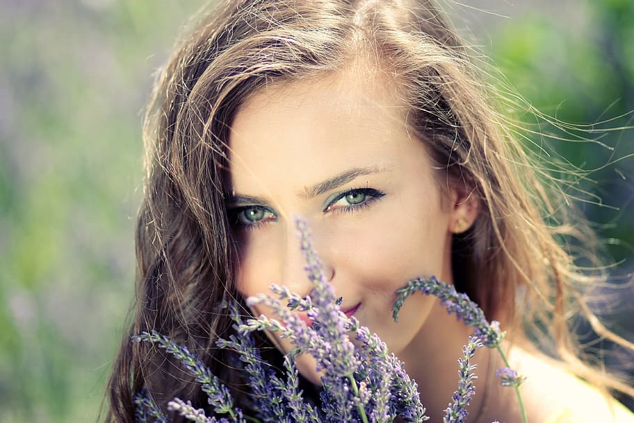 purple lavender infront of woman face, girl, flowers, mov, beauty