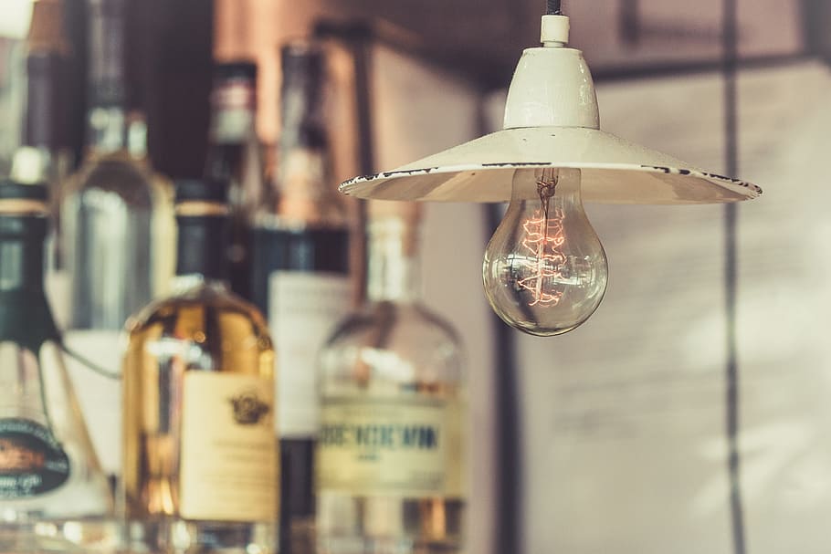 incandescent light bulb near wine bottles, bar, display, alcoholic HD wallpaper