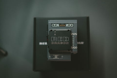 closeup photo of square black cordless device, rectangular gray steel component on top of box HD wallpaper