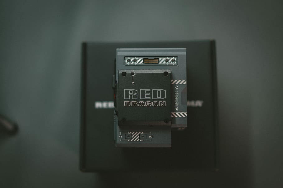 closeup photo of square black cordless device, rectangular gray steel component on top of box HD wallpaper