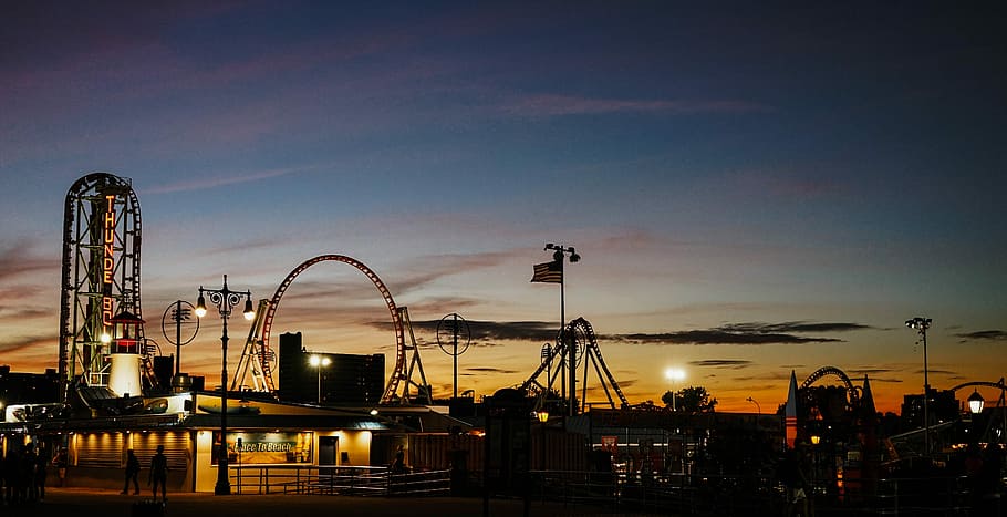 Coney Island Sunset, photo of gray amusement park at golden hour HD wallpaper
