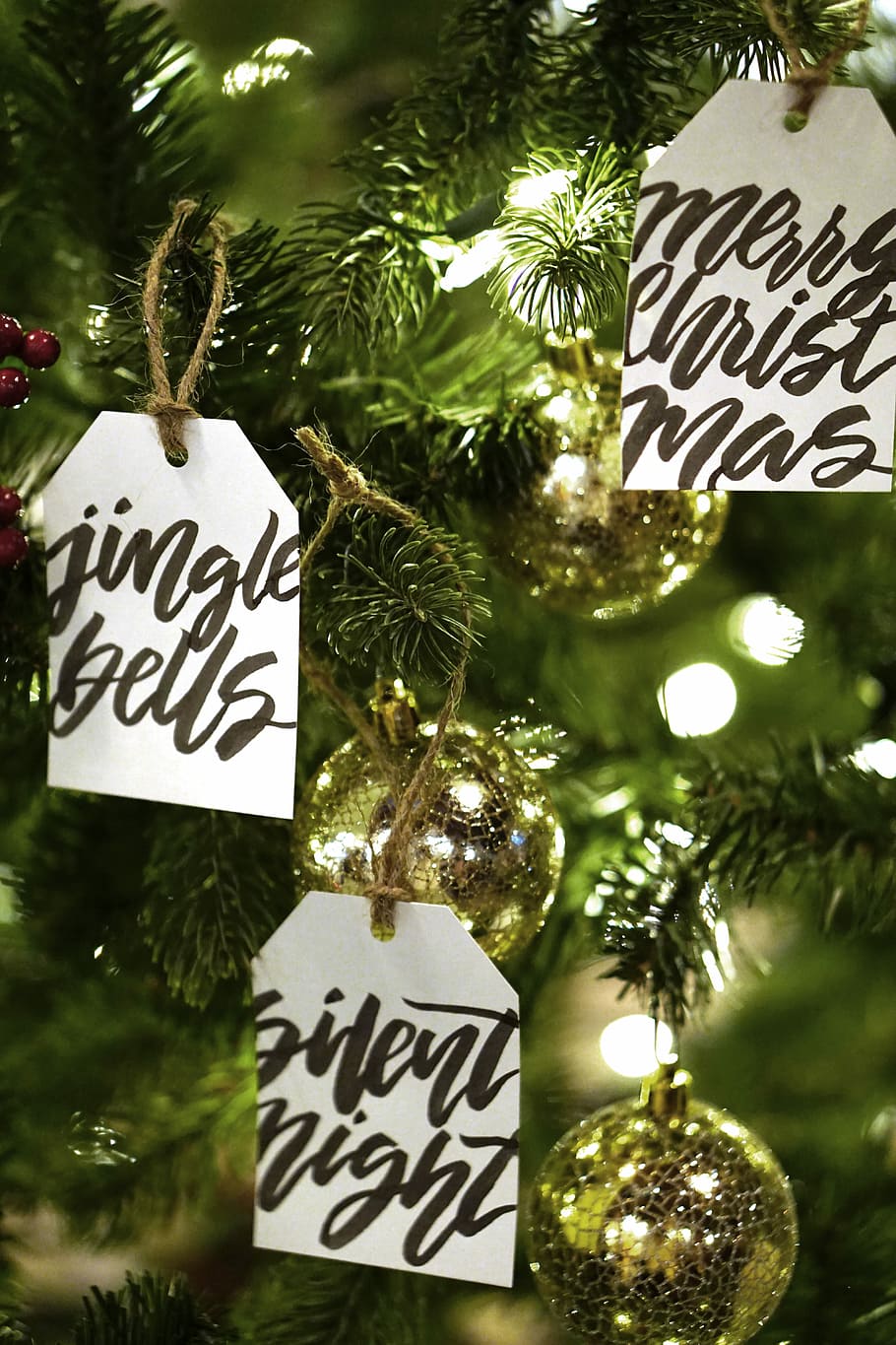 yellow string lights on Christmas tree, round gold ornaments on Christmas tree HD wallpaper