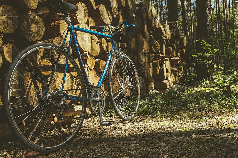 blue rigid bike parked near wood logs, commuter, lean, stack, HD wallpaper