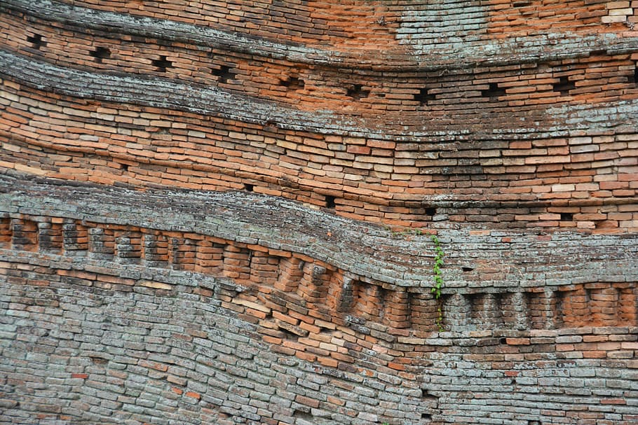 Detail of ancient brick structure with varied brick joining strategies