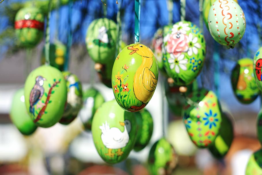 shallow focus photo of assorted green egg hanging decoration lot HD wallpaper