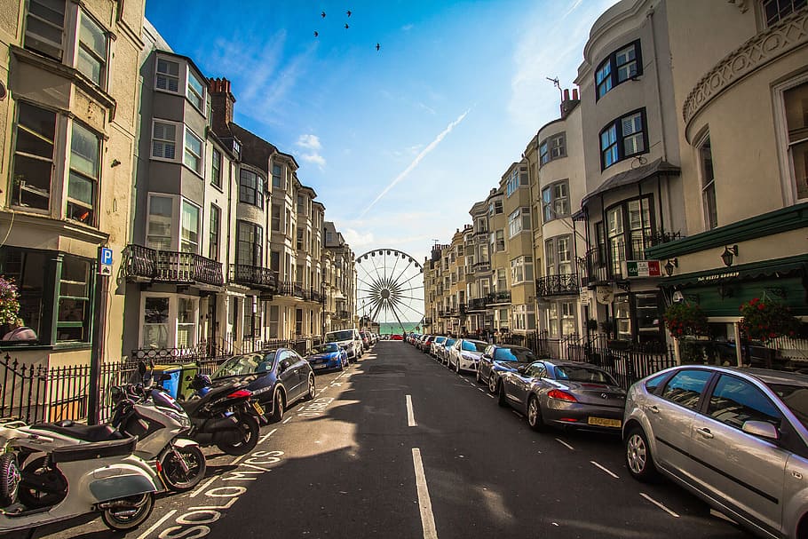 landscape photography of road surrounded by vehicle, brighton HD wallpaper