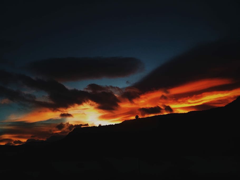 sunset scenery, silhoutte of a mountain during sunset, evening HD wallpaper