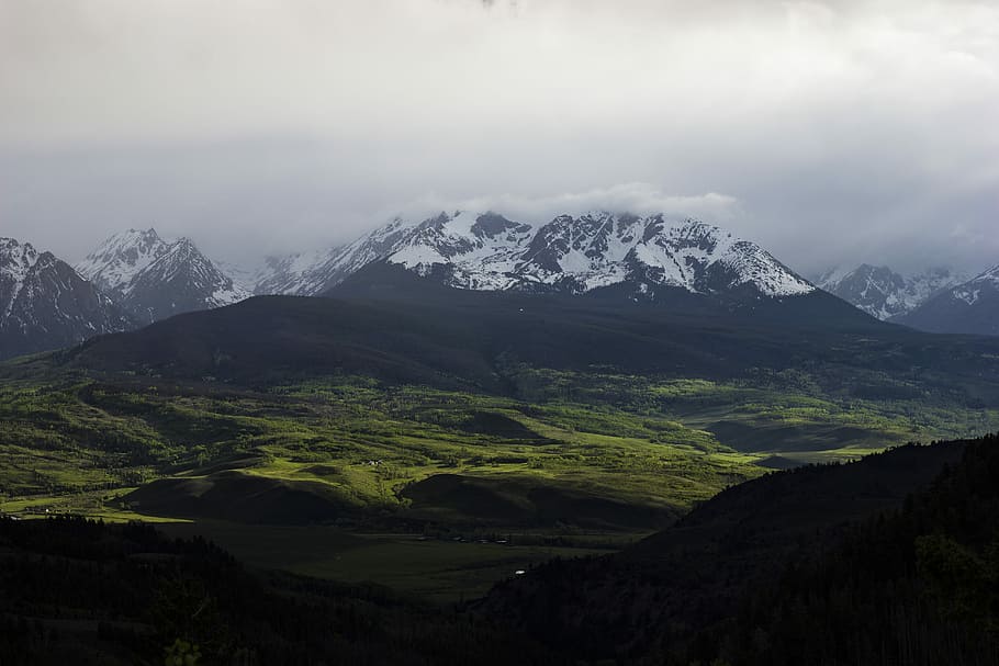 panoramic photo of glacier mountain above forest, green grass field near mountain alps HD wallpaper