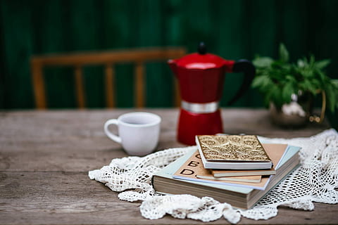 Stack of organizers and red italian coffee maker, vintage, notebook HD wallpaper