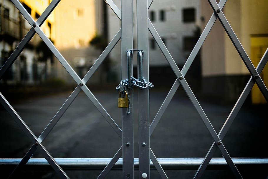 gray steel gate closed with padlock, locked gate focus photography HD wallpaper