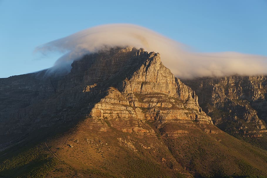 clouds touching brown mountain, brown mountain covered with fog HD wallpaper