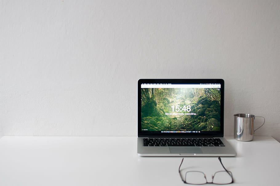 silver laptop computer near steel mug, macbook, notebook, study