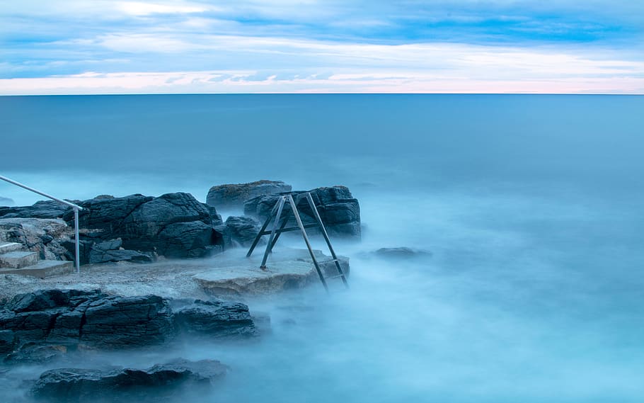 stone near body of water under cumulus clouds, stones near water with fog HD wallpaper