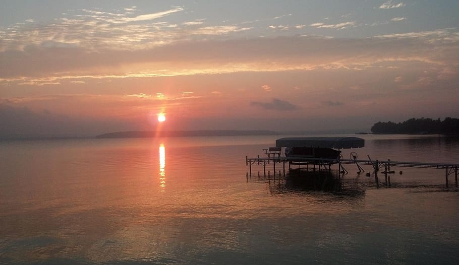 lake, mist, sunset, haze, calm, reflection, foggy, serene, dock HD wallpaper