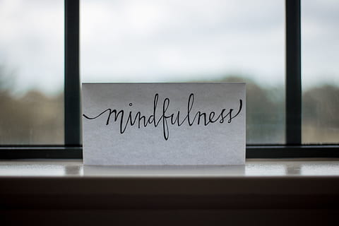 mindfulness printed paper near window, selective photo of Mindfulness printed paper on clear glass window HD wallpaper
