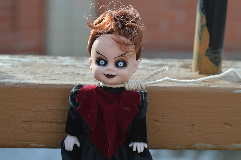 female doll with rope on neck, vampire, day of the dead, eyes