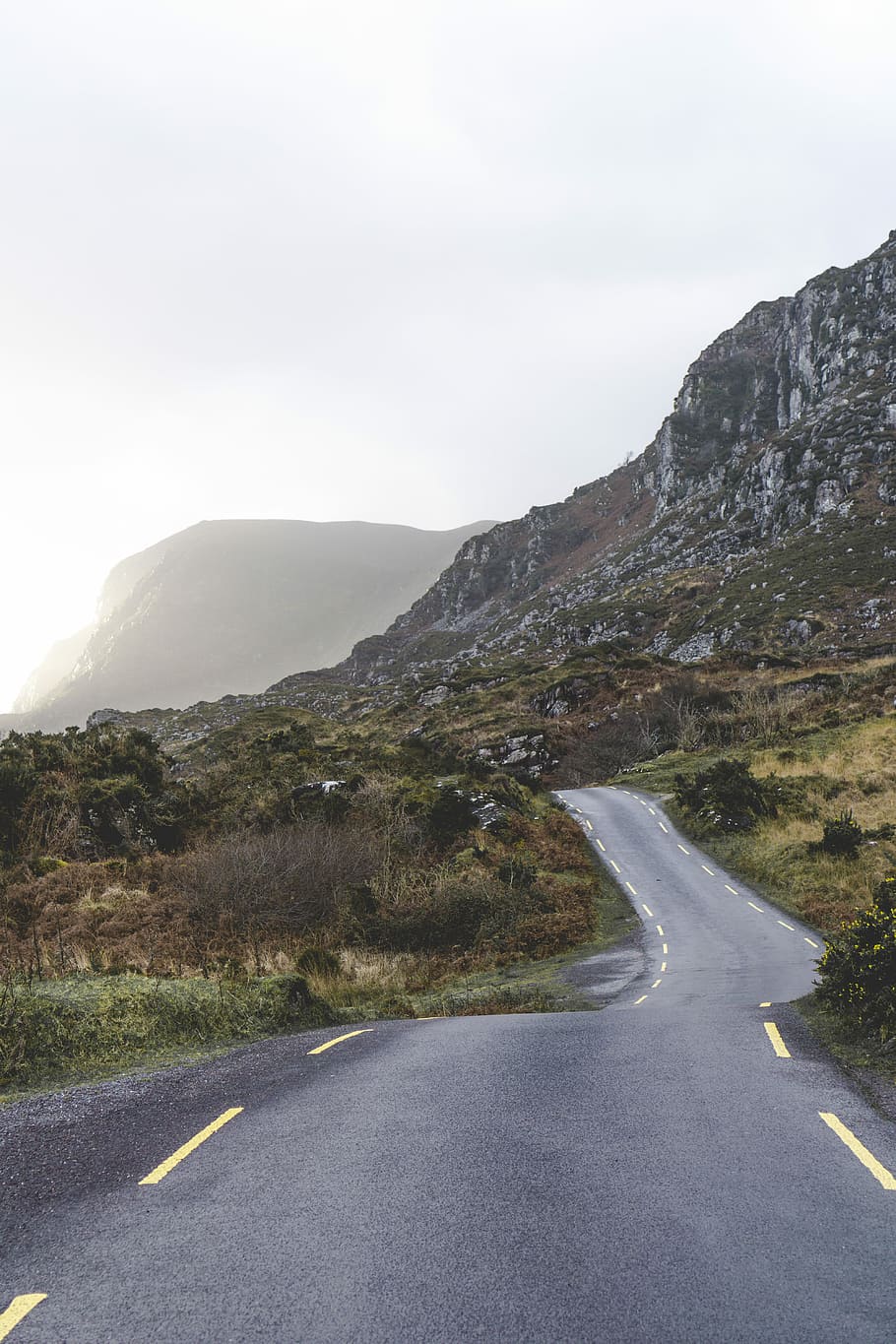 concrete road across the mountain, landscape photo of road between mountain HD wallpaper