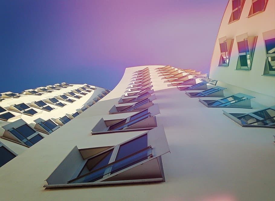 low-angle photography of white concrete building during daytime HD wallpaper