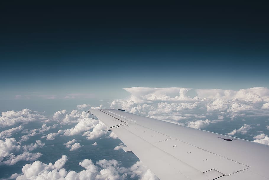 white plane wing above white clouds, left airplane wing, sky HD wallpaper