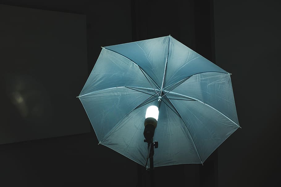 umbrella in front of switched on light, gray studio umbrella HD wallpaper