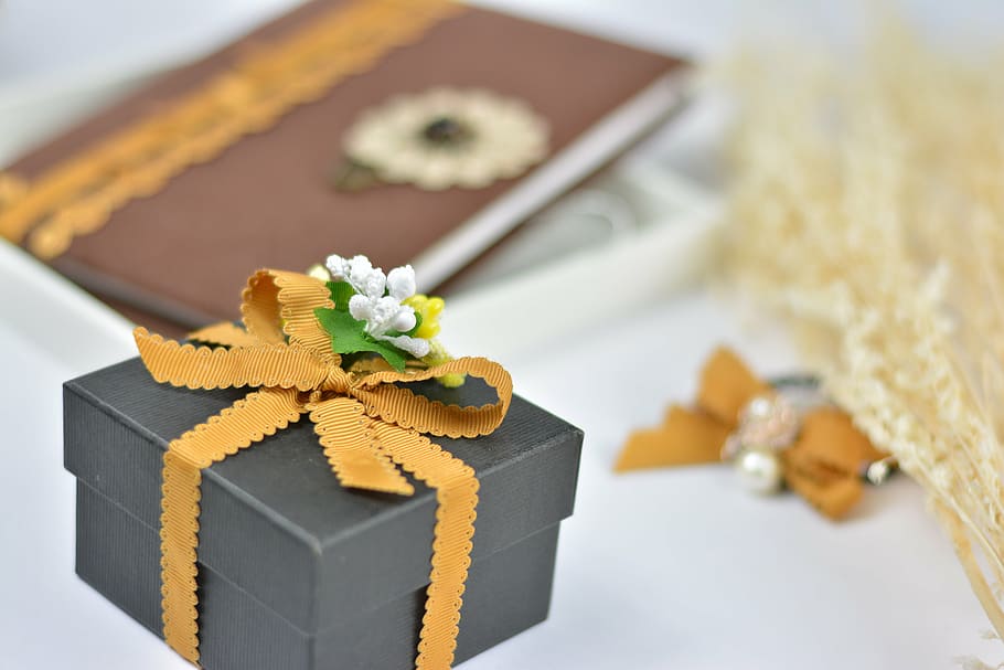 closed gift box near journal, webbing, packaging, indoors, no people HD wallpaper