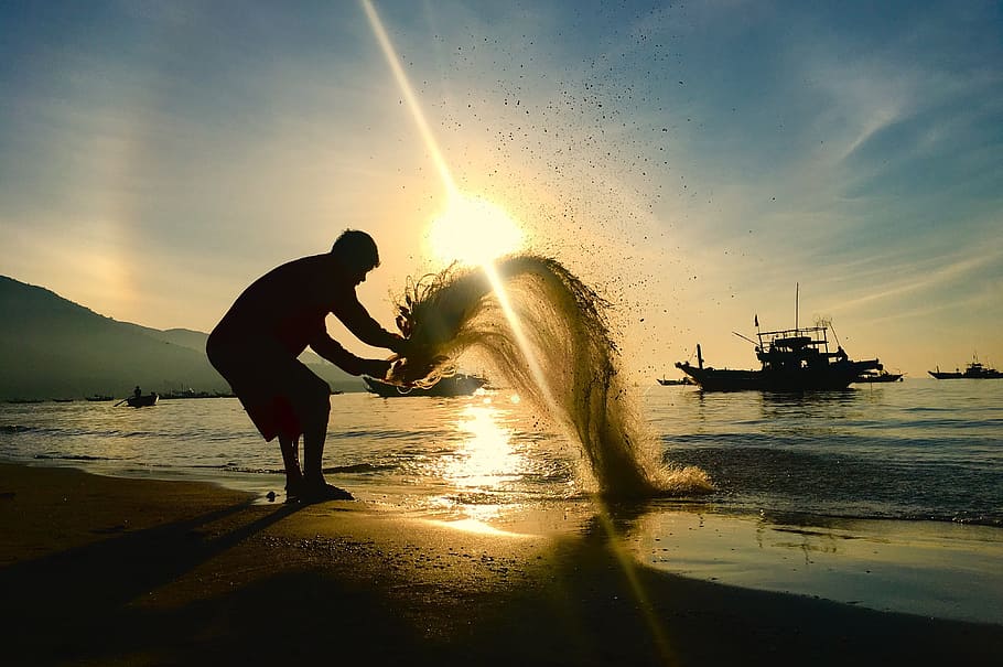 man standing at the shoreline pouring out sand, vietnam, danang, HD wallpaper