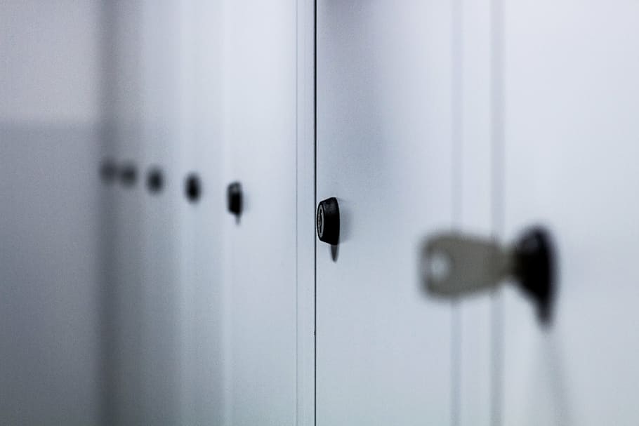selective focus photography of black key port, lockers, cabinets HD wallpaper