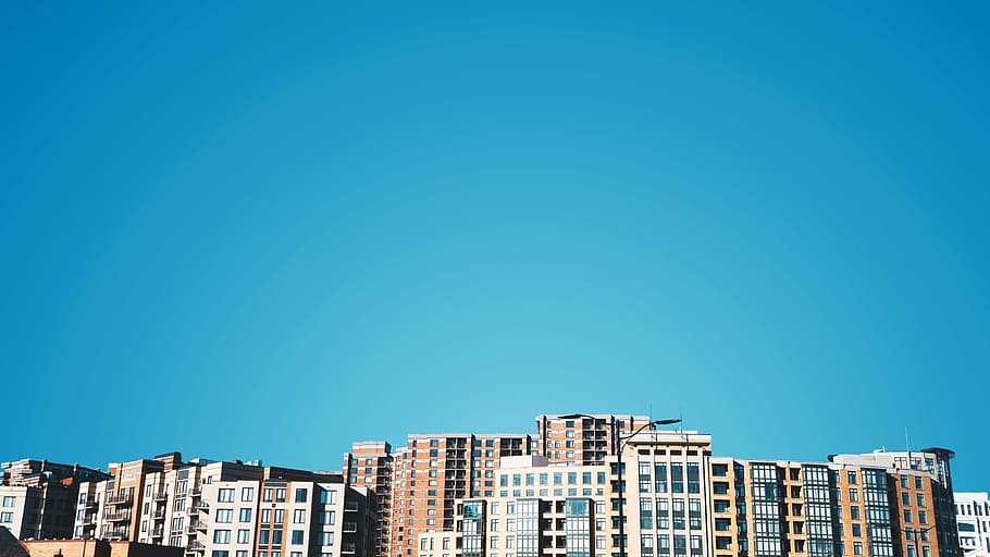 Cityscape, high-rise building under blue sky, architecture, building exterior HD wallpaper