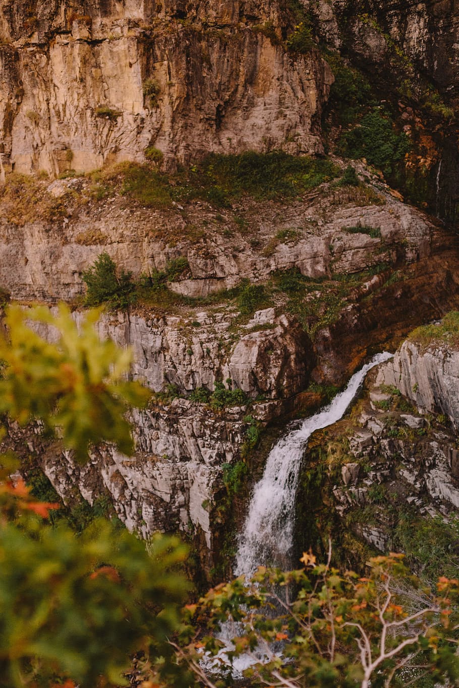 landscape photo of mountain and waterfalls, selective focus photography of waterfall in forest HD wallpaper