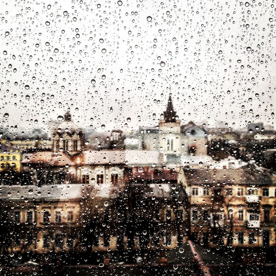clear glass window with tear drop rain, selective focused photo of a window with water drops