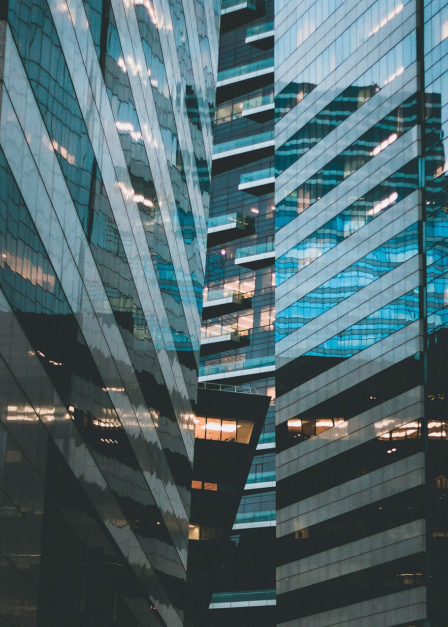photo of high-rise buildings during daytime, high rise glass building HD wallpaper